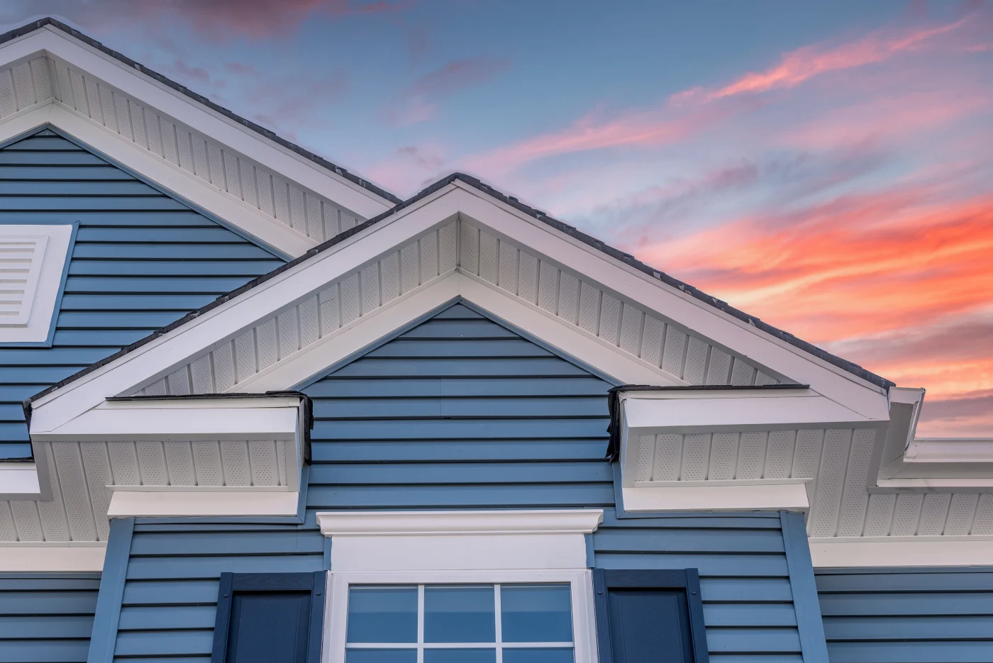A nice home with blue siding.