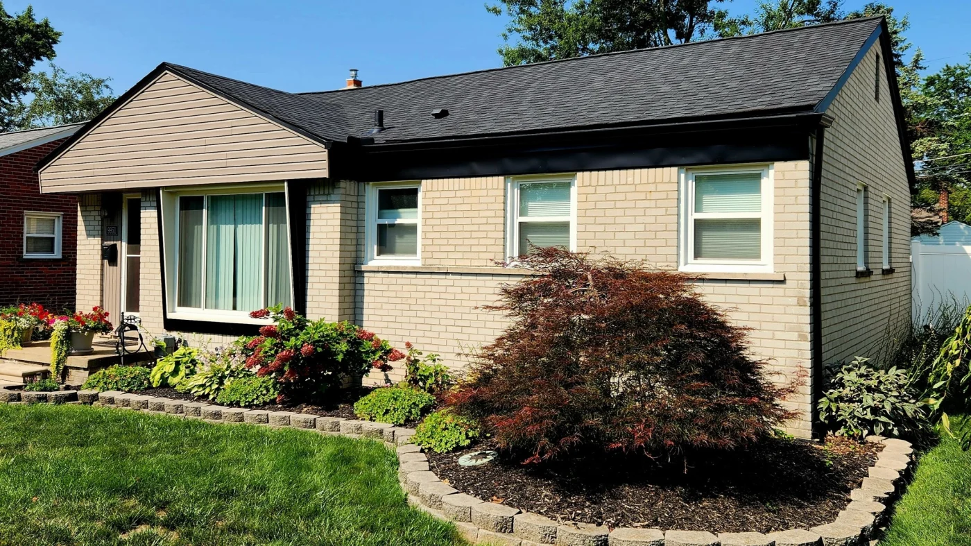 A black shingle roof recently installed by Kroll Construction