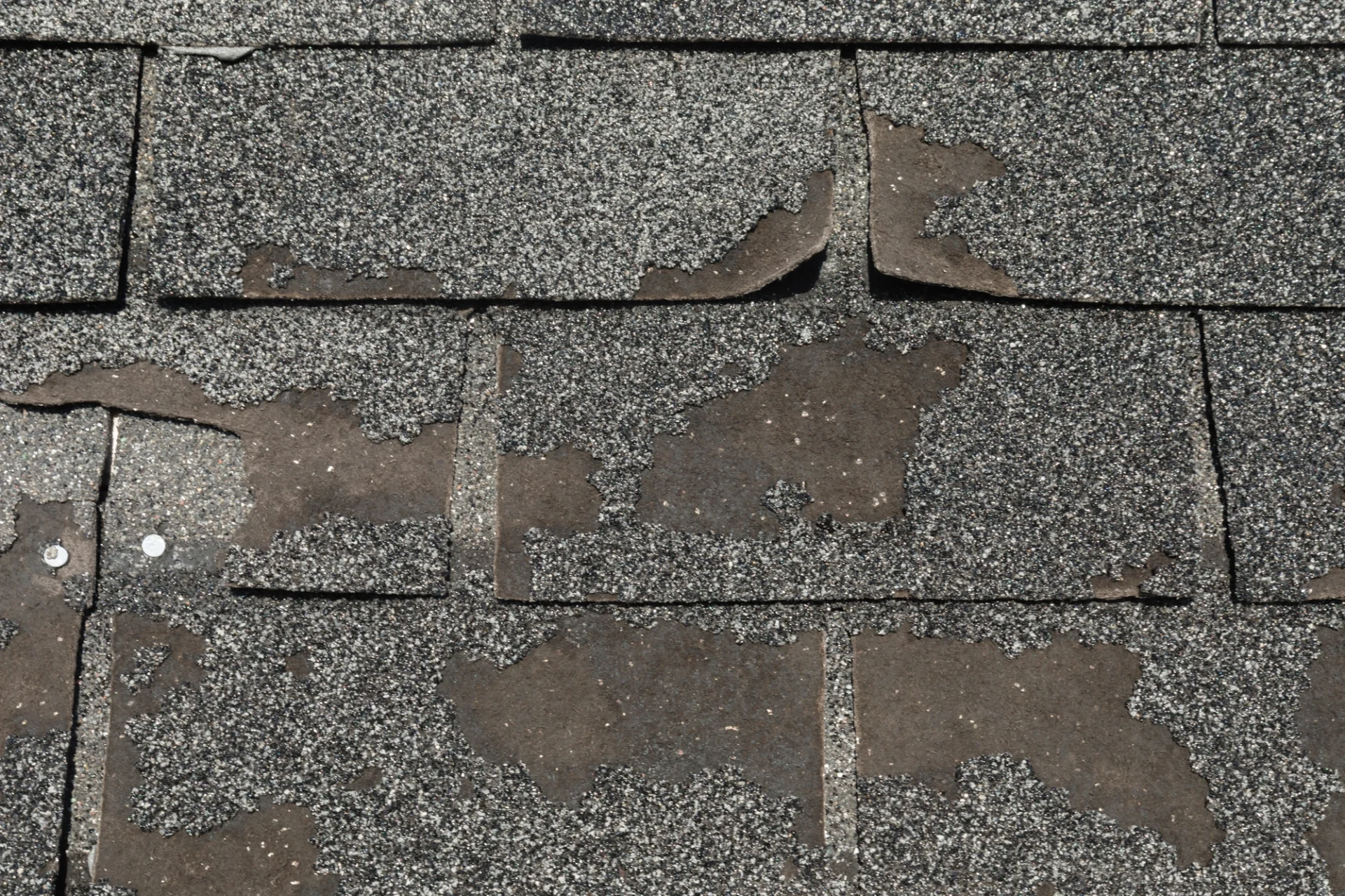 Asphalt Shingle With Bald Spots And Breaks