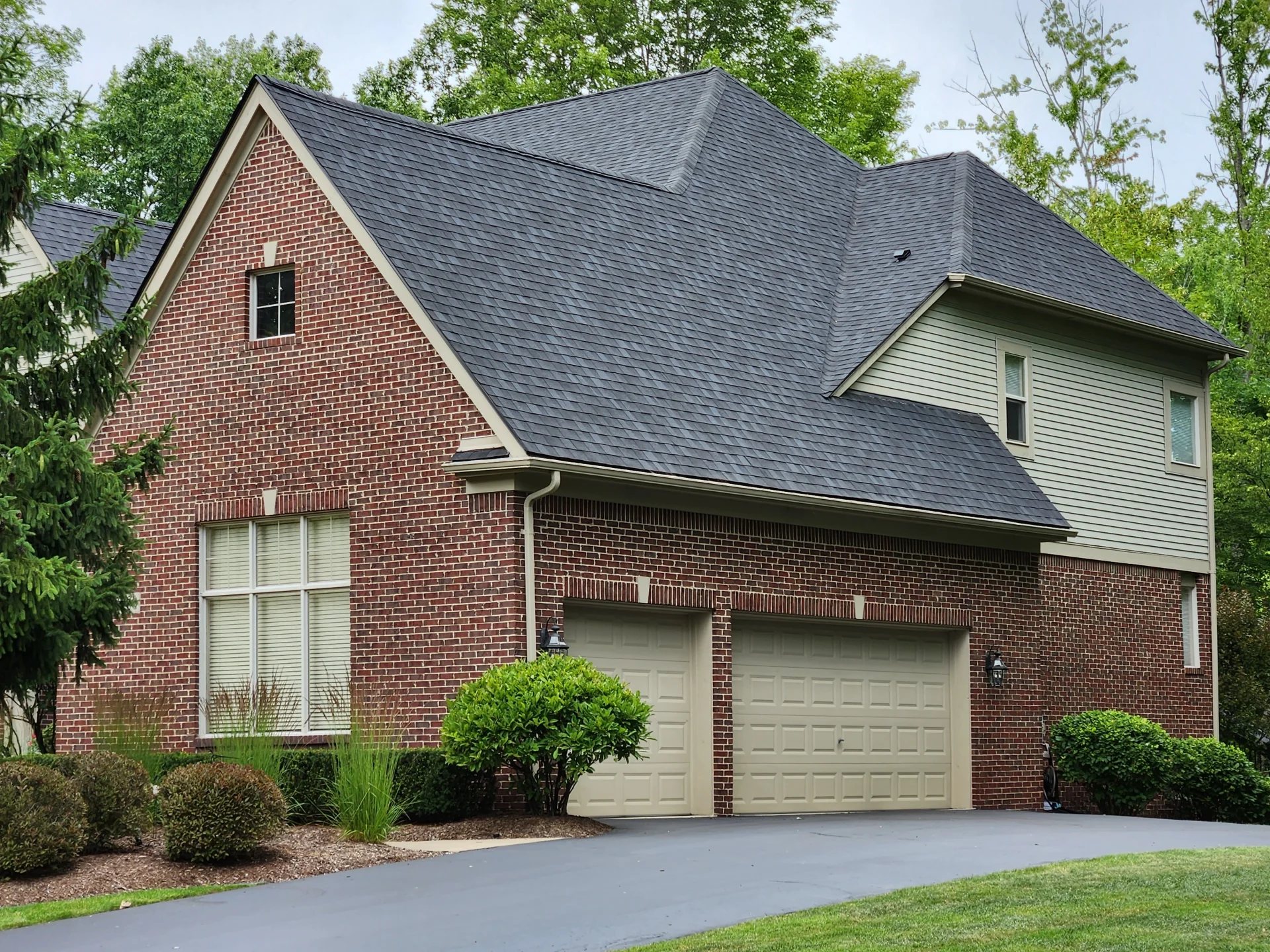 Black asphalt shingles on Brighton, MI home worked on by Kroll Construction