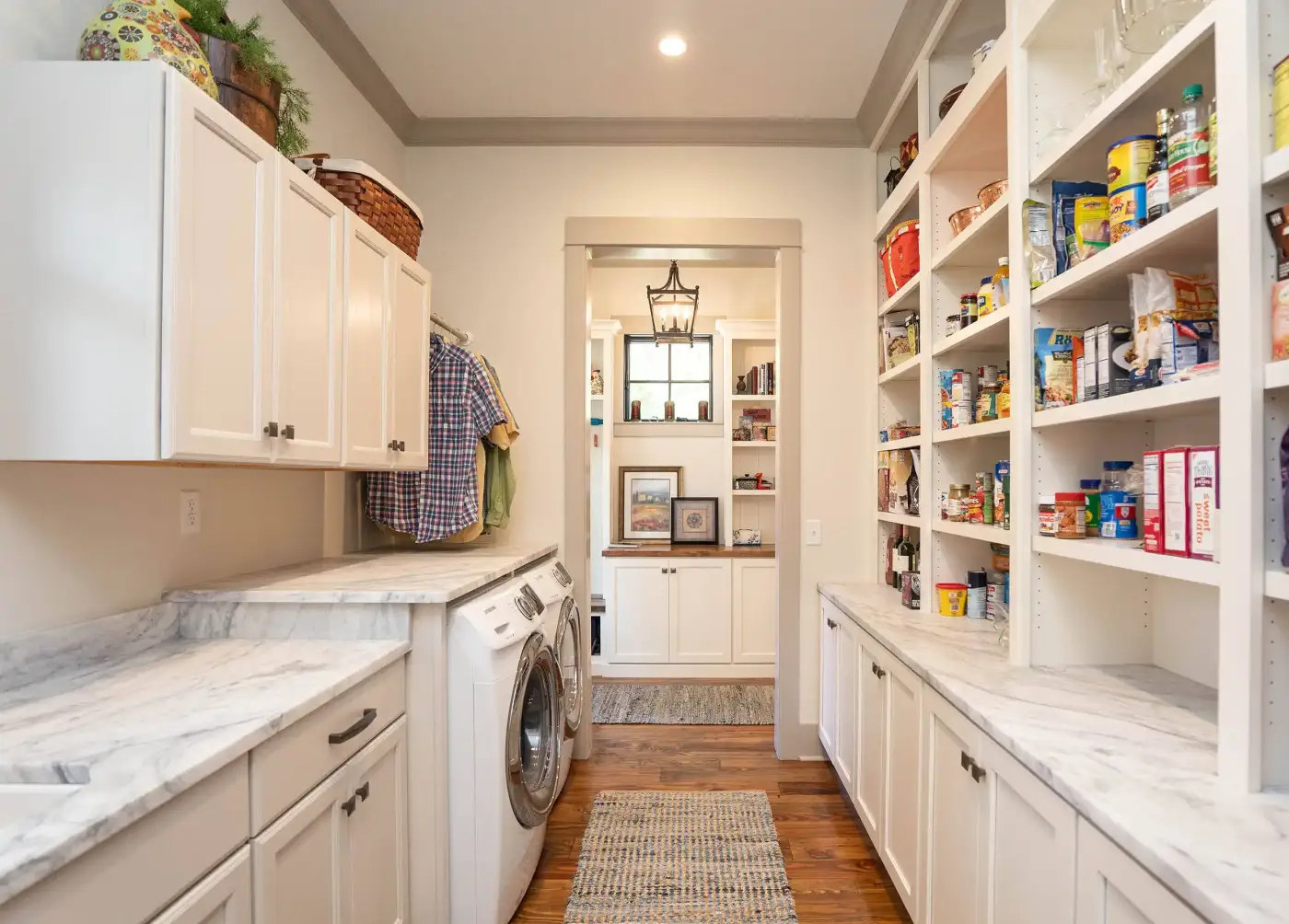 Efficient laundry room with shelves for food storage