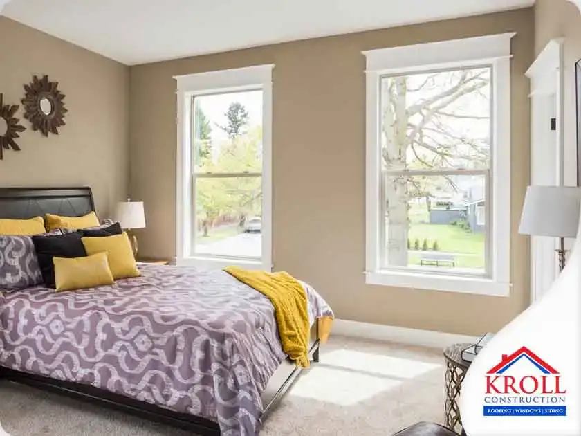 Interior view of windows in bedroom overlooking yard