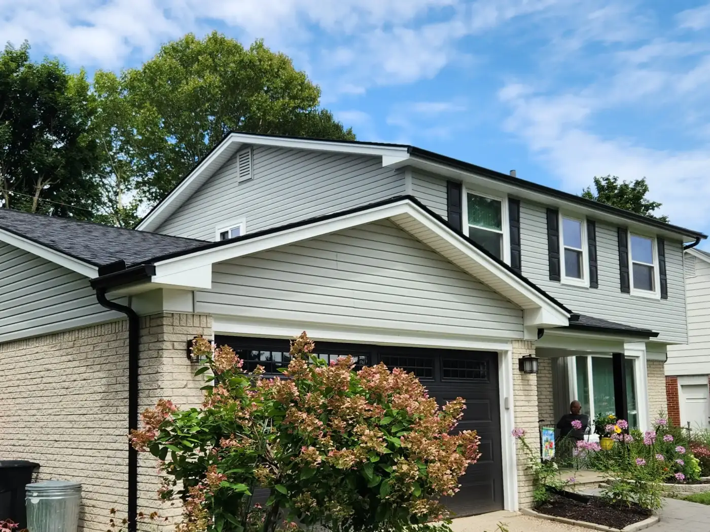 Single-family home with tan siding