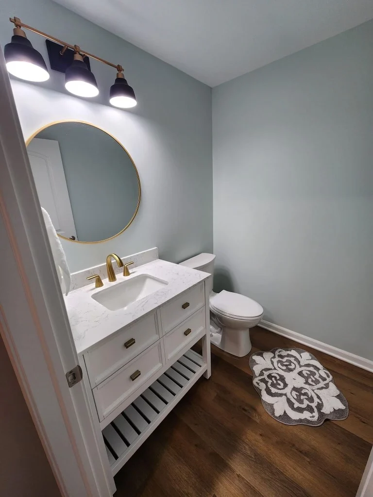 Modern bathroom remodeling project completed by Kroll Construction in Garden City, Michigan.