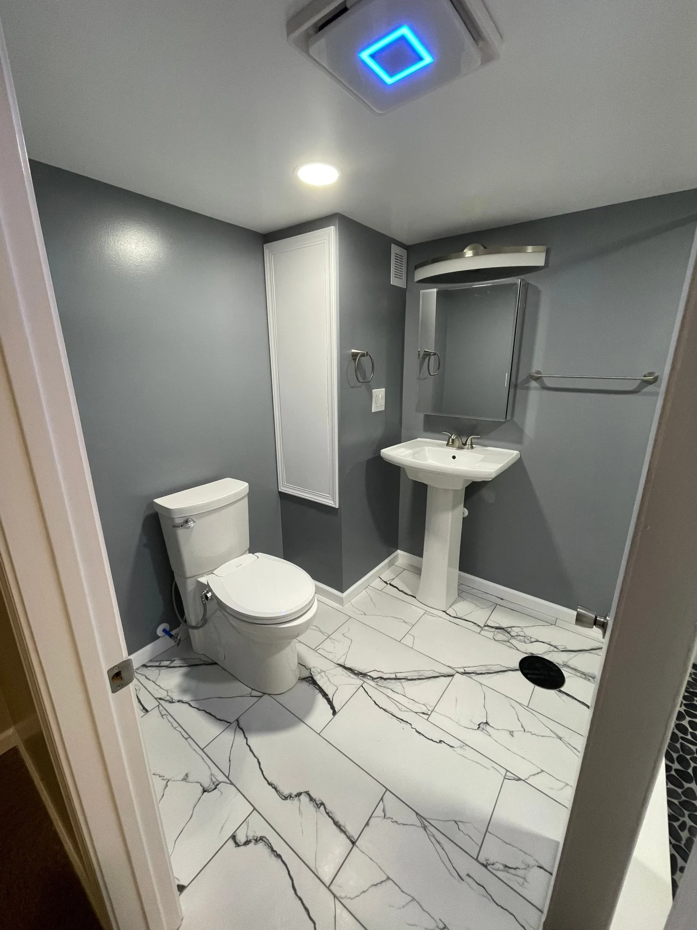 Bathroom remodeling project completed by Kroll Construction in Garden City, Michigan.