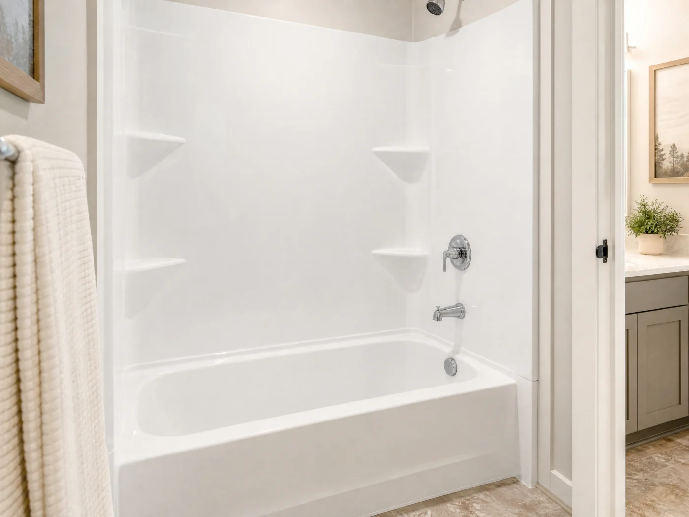 A new shower with white base and green shower walls for a modern look.