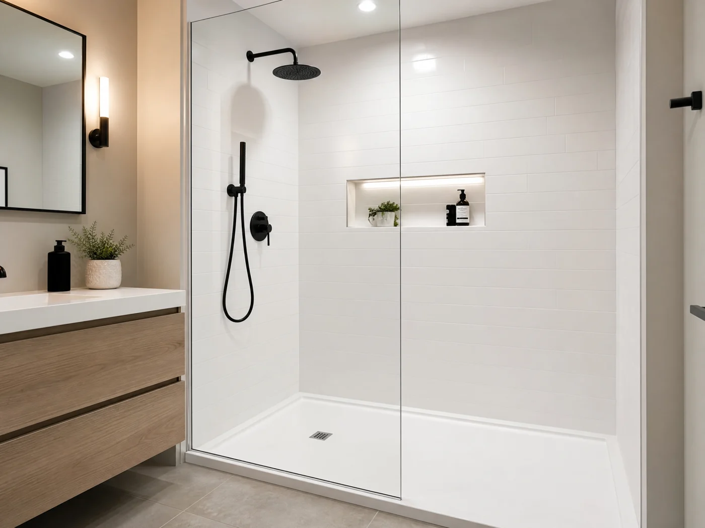 A low-threshold shower in white, installed in a bathroom for a modern look.